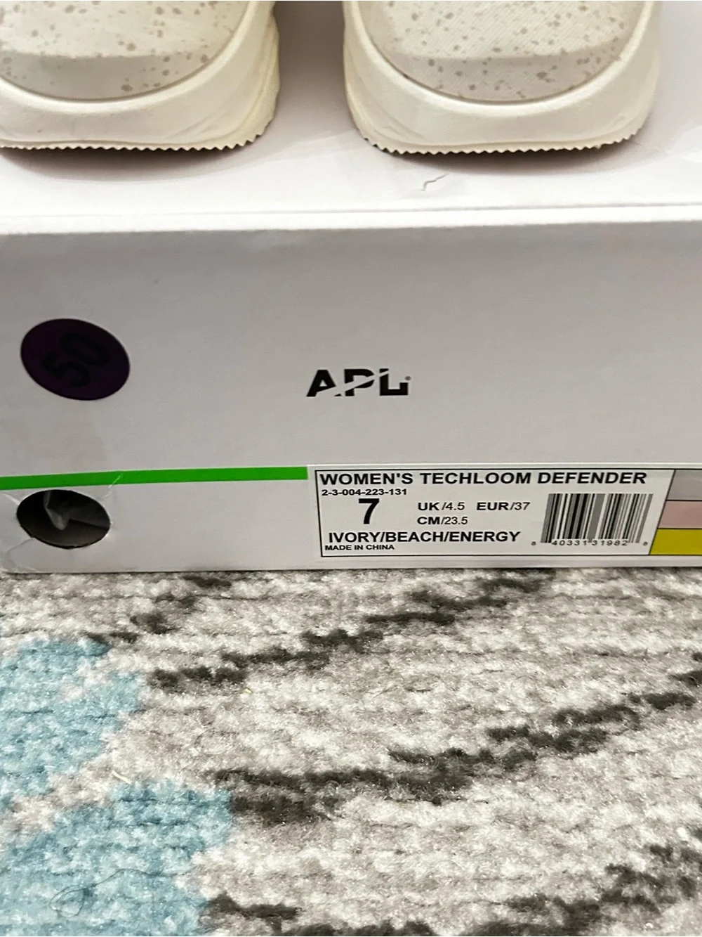 APL Women’s Techloom Defender High-Top Sneakers in Cream with Neon Yellow Logo